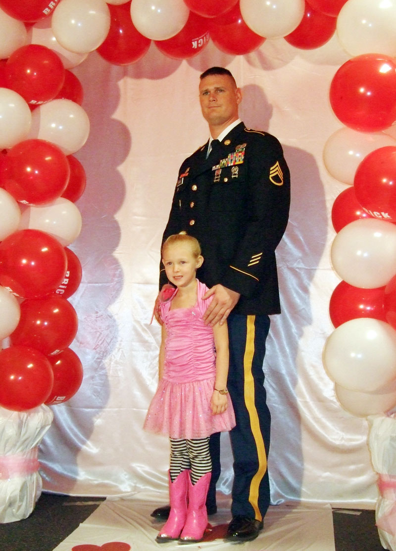 photo of a dad and daughter